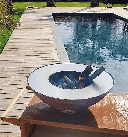 Holiday home Aux Palmiers,piscine 28°,petanque,coeur Bassin Audenge